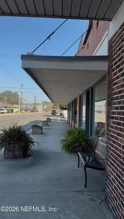 a view of a chairs and table in a room