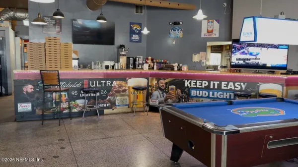 a front view of a house with lounge chair