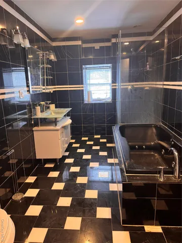 a room with gym equipment and a window