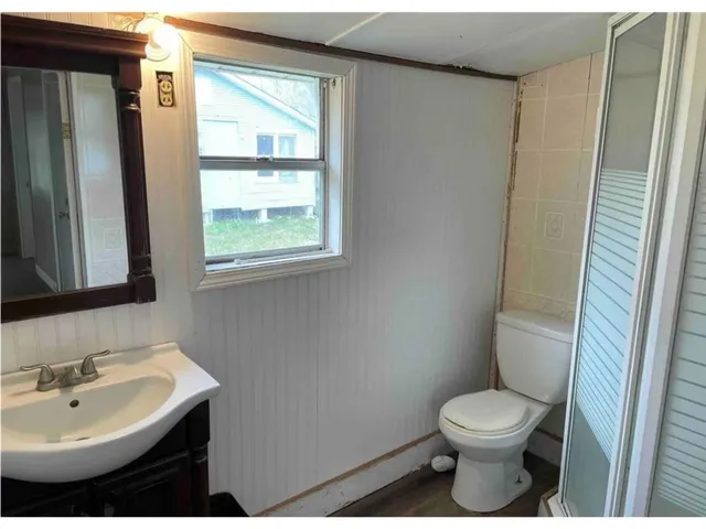 a bathroom with a sink and a toilet