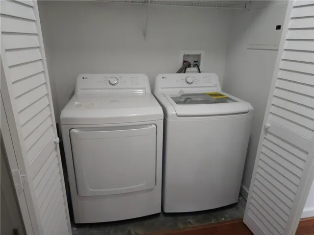a utility room with dryer and washer