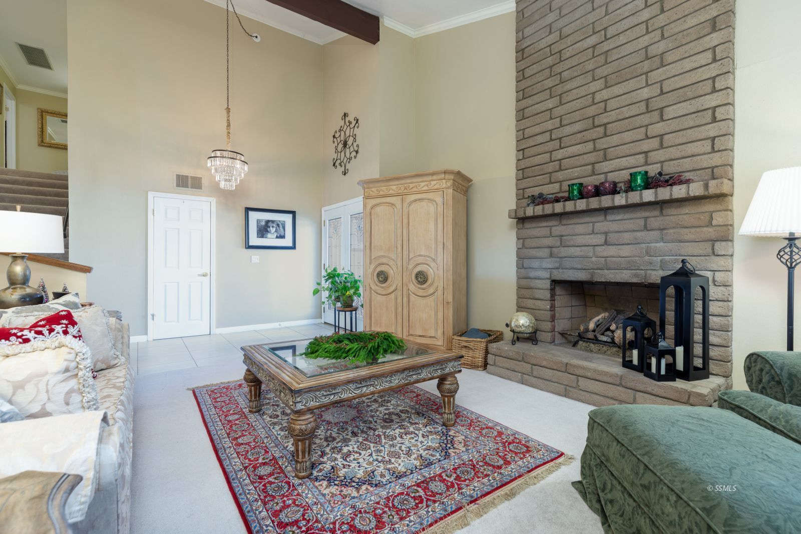 815 Hurschell Avenue Ridgecrest, CA 93555 - Photo 6 of 43 a living room with furniture and a fireplace