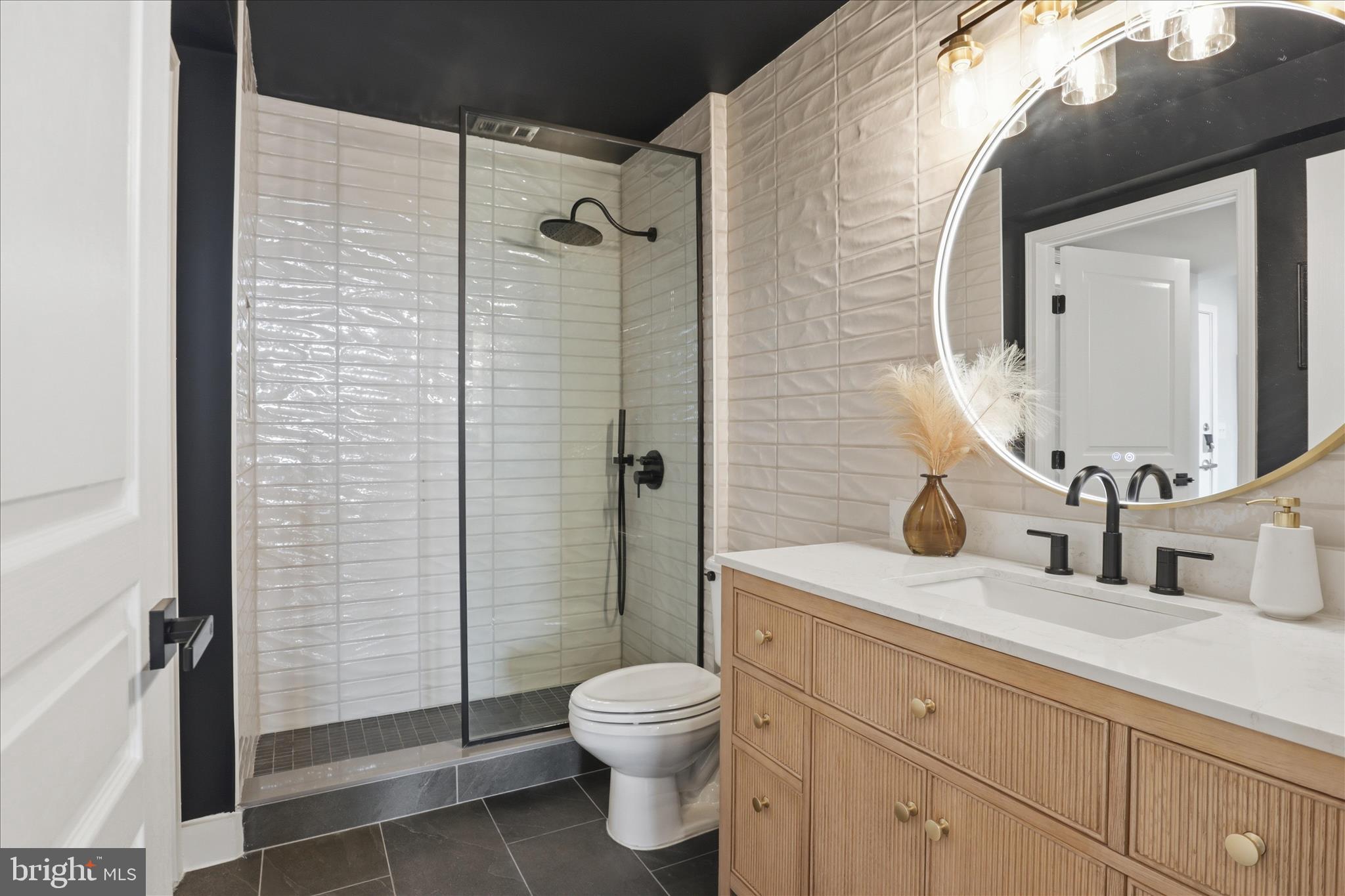 12000 Market Street, Unit 488 Reston, VA 20190 - Photo 19 of 49 PRIMARY BATH updated with spa like features