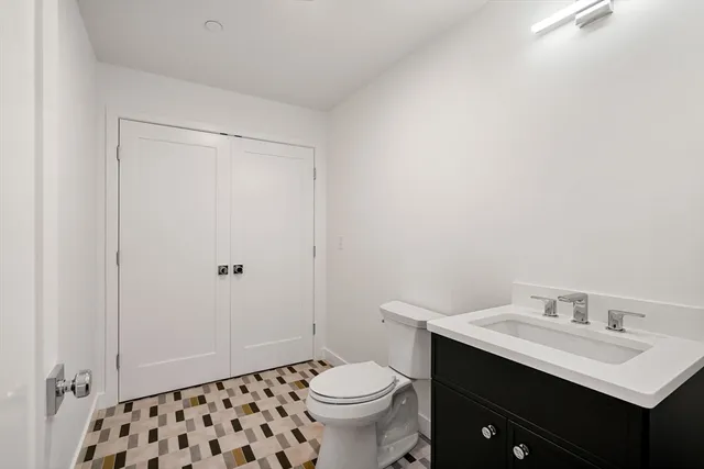 a bathroom with a sink and a toilet