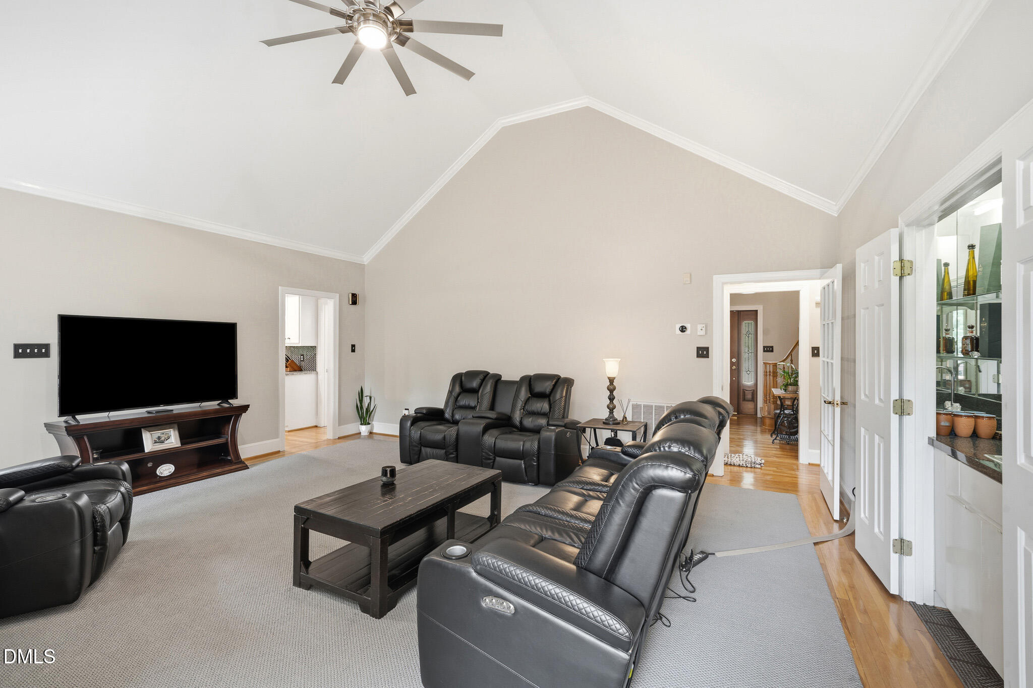 3735 Stoneybrook Drive Durham, NC 27705 - Photo 7 of 44 a living room with furniture and a flat screen tv