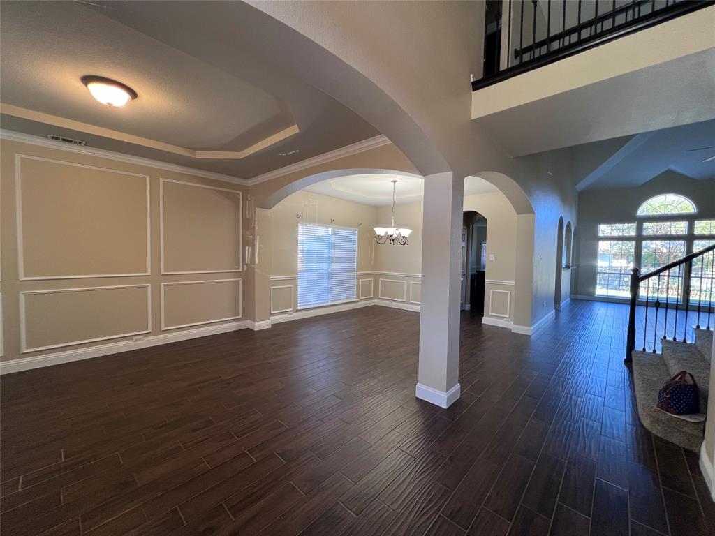 8158 Painted Tree Trail Fort Worth, TX 76131 - Photo 2 of 18 a view of empty room with wooden floor