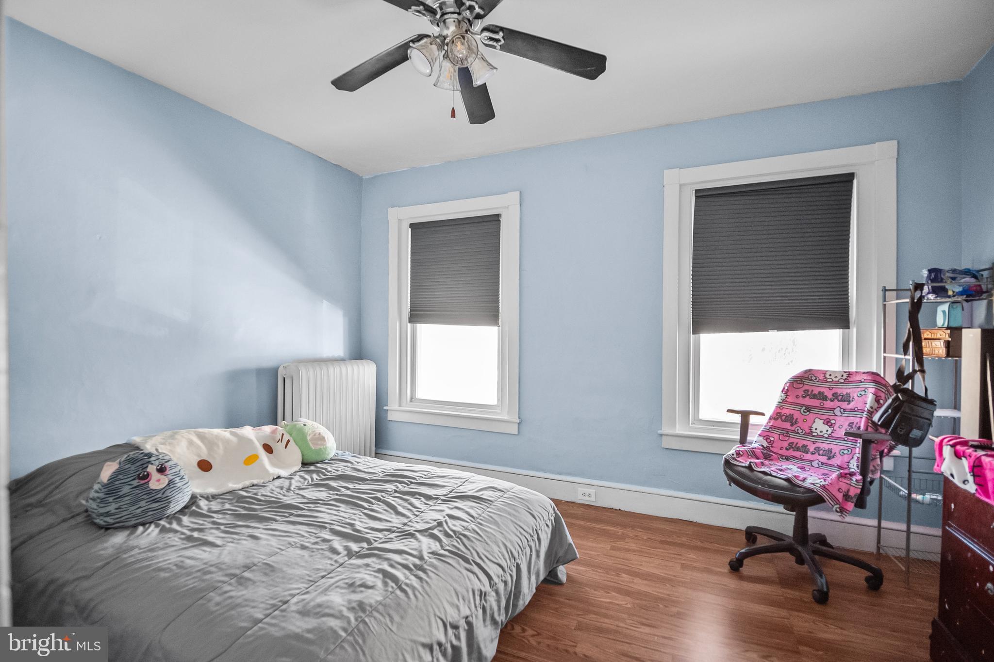 614 Maple Street Reading, PA 19602 - Photo 17 of 23 a bedroom with a bed and a window