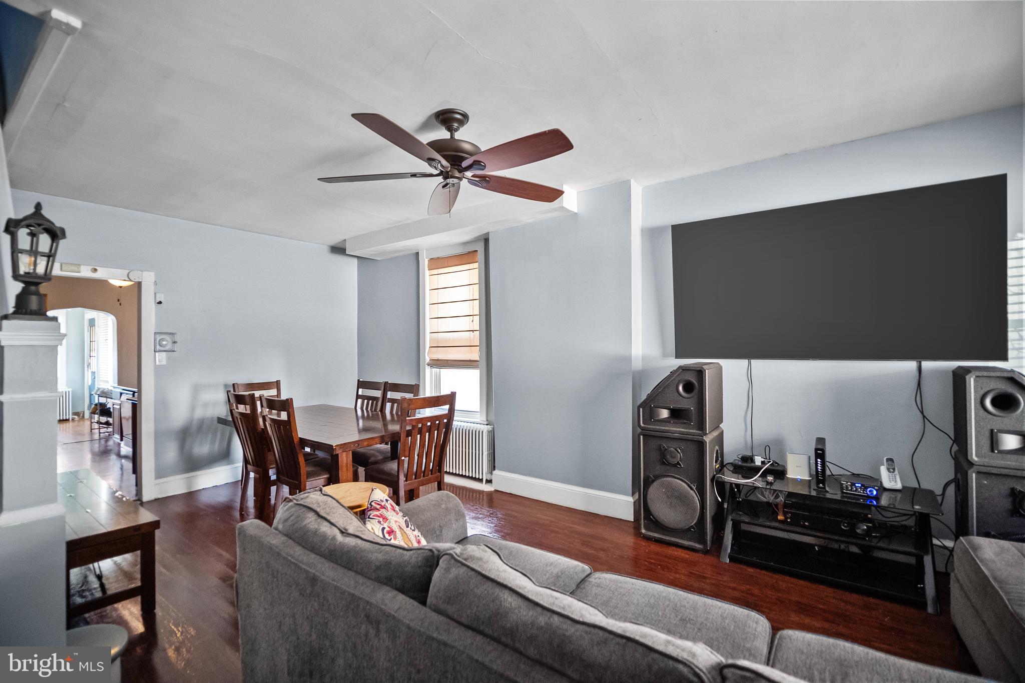 614 Maple Street Reading, PA 19602 - Photo 6 of 23 a living room with furniture and a flat screen tv