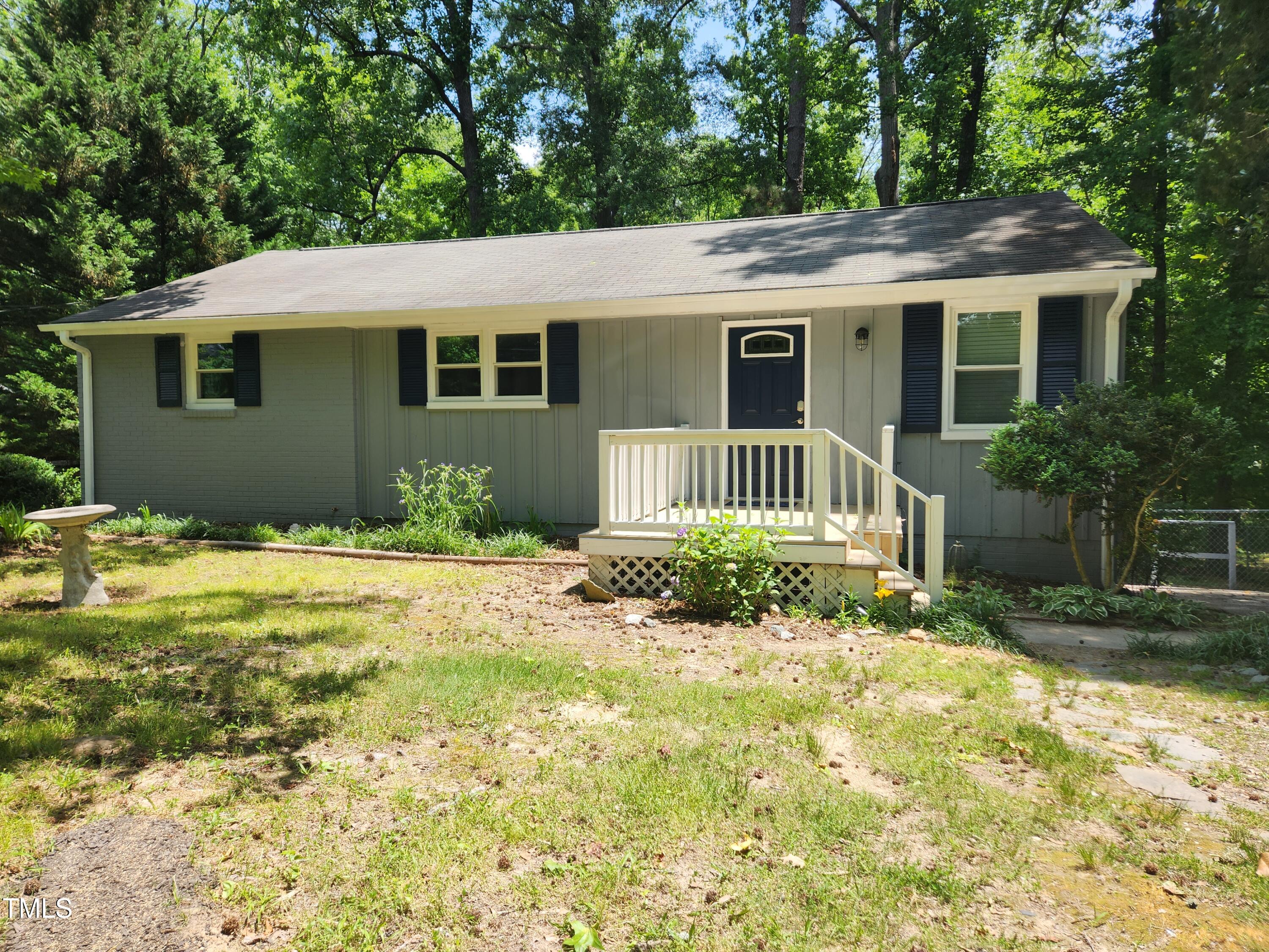 427 Ridgefield Road Chapel Hill, NC 27517 - Photo 2 of 27 a front view of a house with a yard