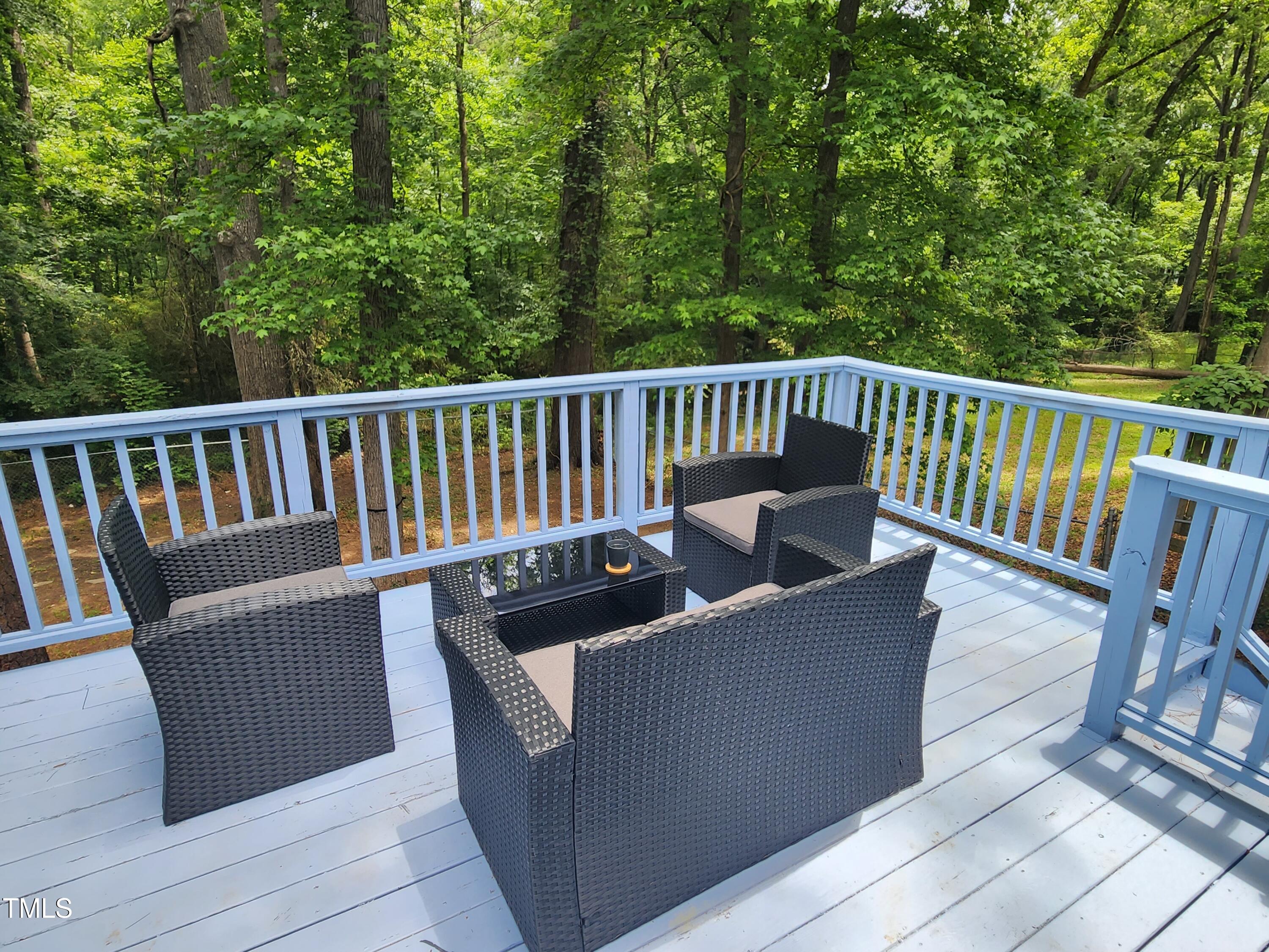 427 Ridgefield Road Chapel Hill, NC 27517 - Photo 25 of 27 a balcony with wooden floor and fence