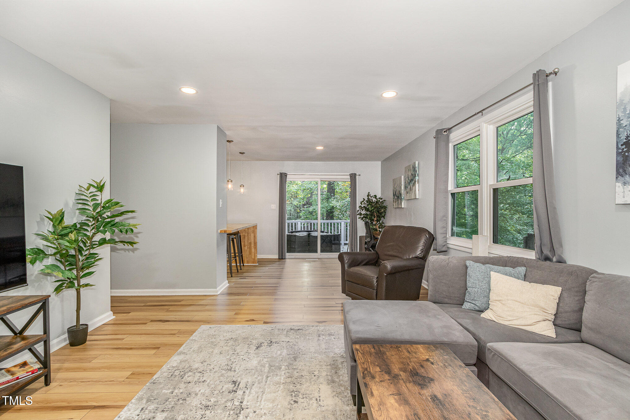 427 Ridgefield Road Chapel Hill, NC 27517 - Photo 6 of 27 a living room with furniture and a large window