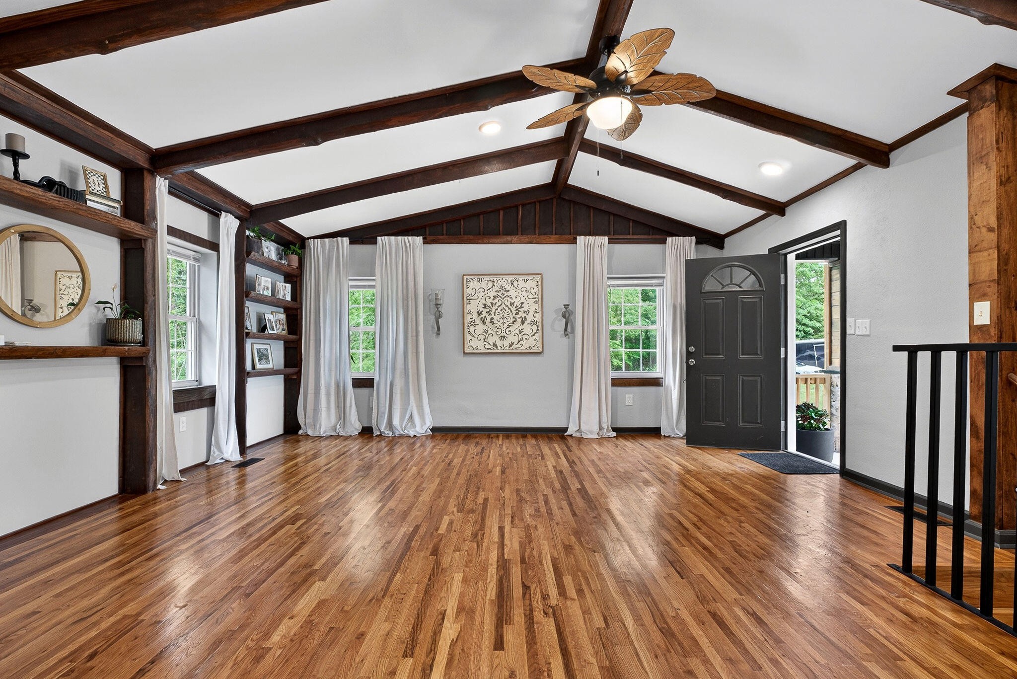 9388 Harrison Ferry Road McMinnville, TN 37110 - Photo 4 of 41 a view of a hallway with wooden floor and entryway