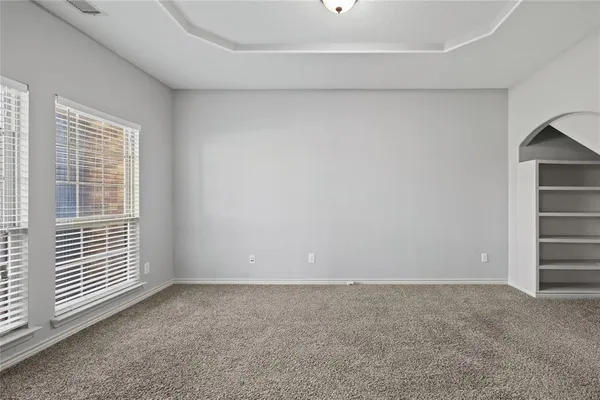 a view of a kitchen from the hallway