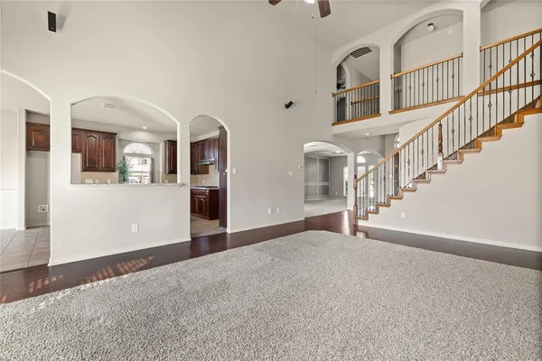 a kitchen with stainless steel appliances granite countertop a stove and a refrigerator