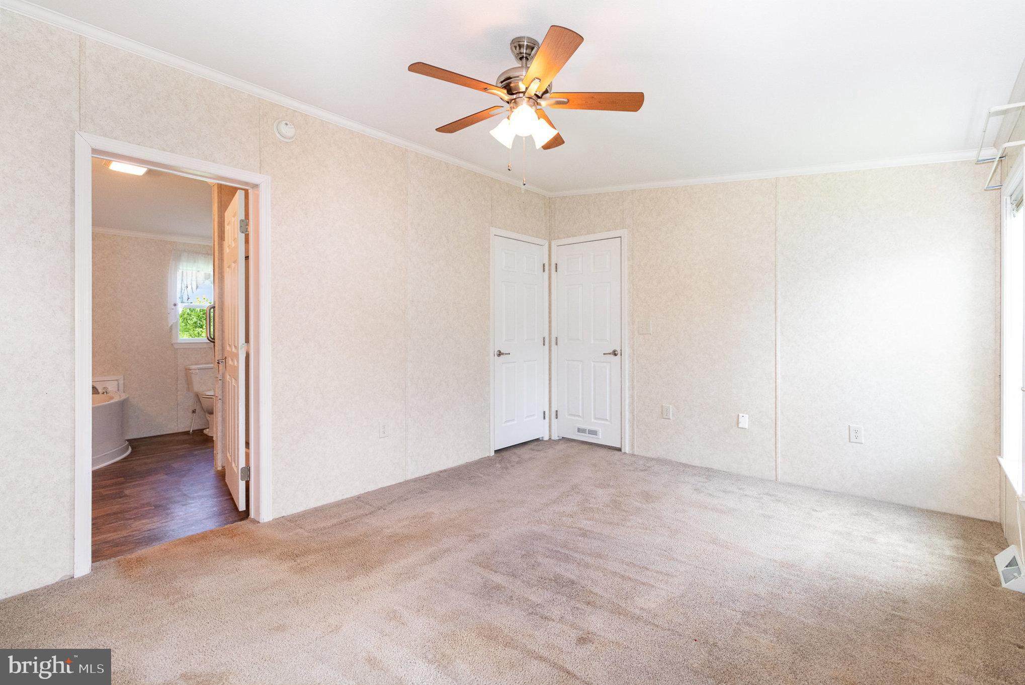 75 Ridgewood Manor Manheim, PA 17545 - Photo 18 of 29 wooden floor in an empty room and a bathroom