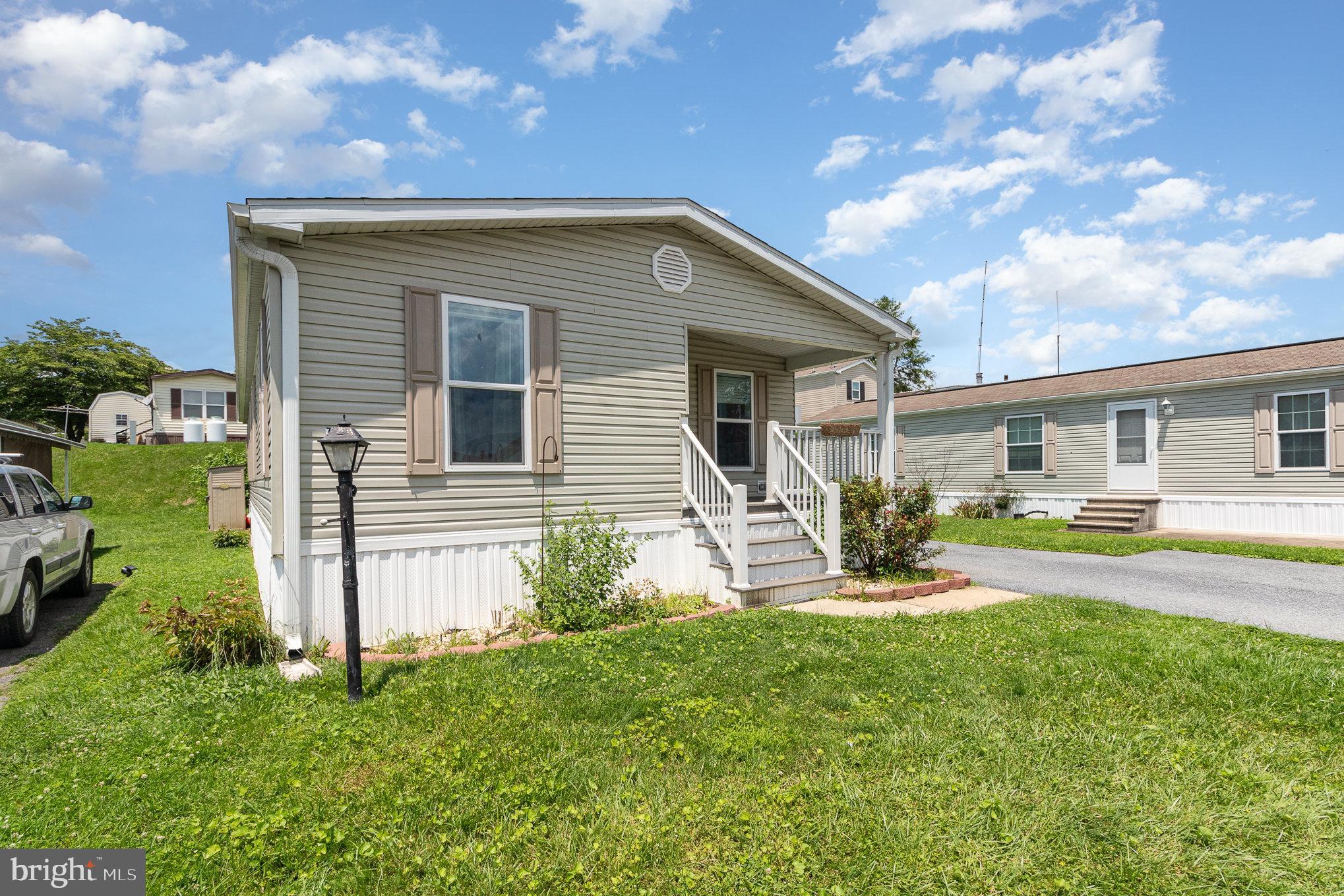 75 Ridgewood Manor Manheim, PA 17545 - Photo 3 of 29 a view of a house with backyard and sitting area