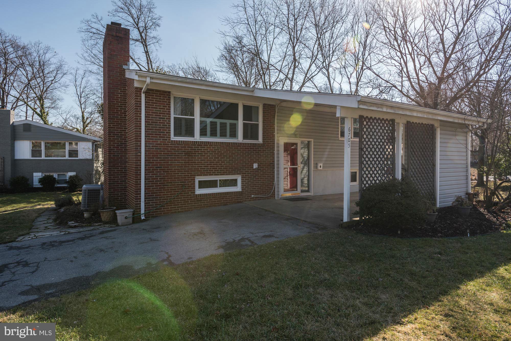 6705 Maxalea Road Baltimore, MD 21239 - Photo 1 of 30 a view of a house with backyard and garden