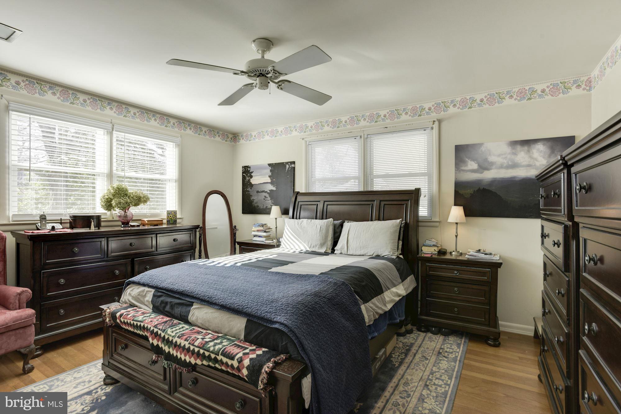 6705 Maxalea Road Baltimore, MD 21239 - Photo 13 of 30 a bed room with a bed and a television