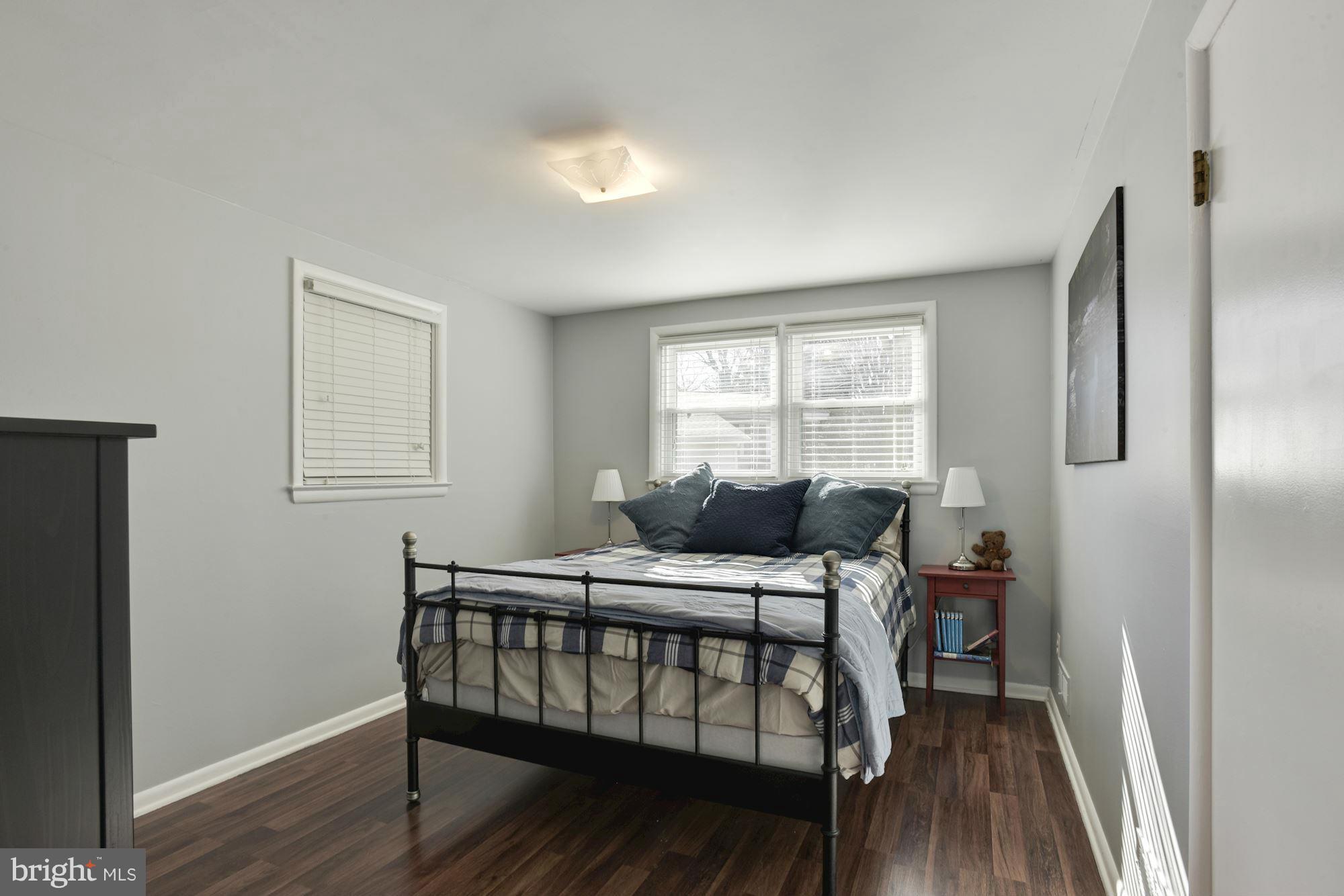 6705 Maxalea Road Baltimore, MD 21239 - Photo 18 of 30 a bedroom with a bed and a window