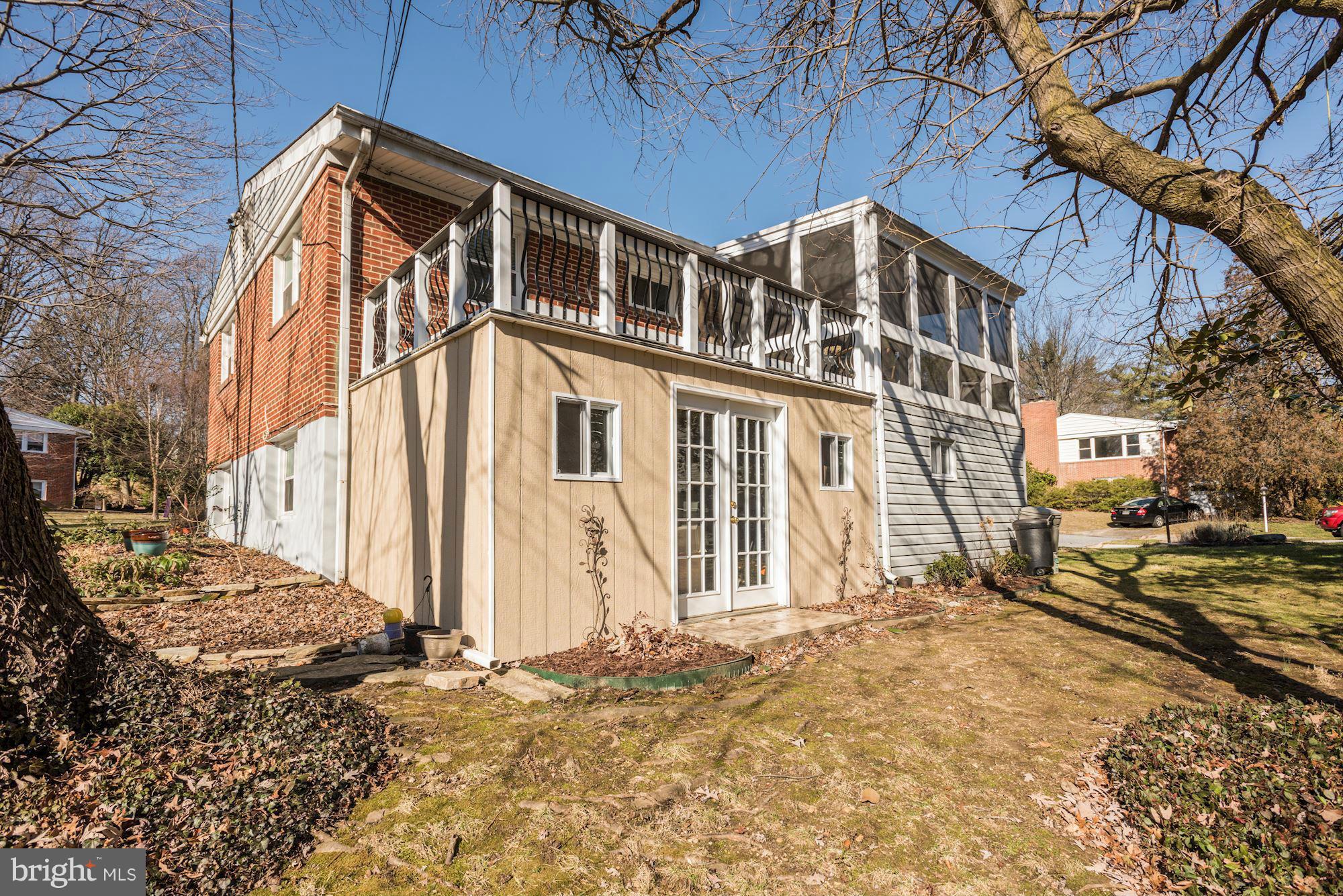6705 Maxalea Road Baltimore, MD 21239 - Photo 29 of 30 a view of a house with a yard