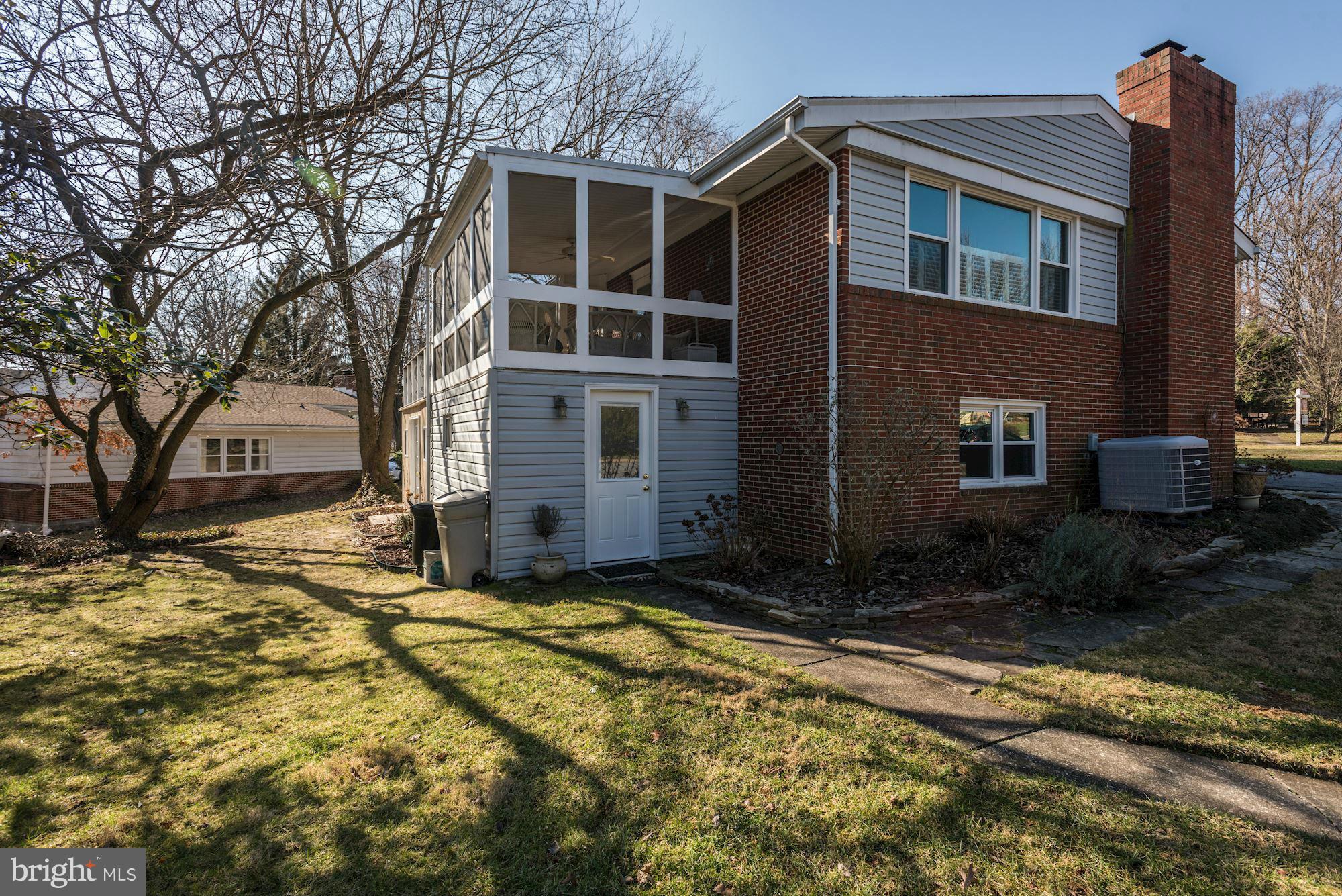 6705 Maxalea Road Baltimore, MD 21239 - Photo 30 of 30 a view of a house with a yard
