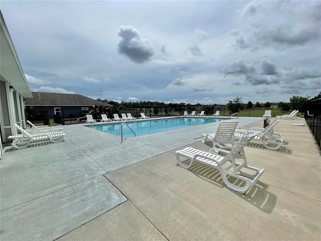1021 Southwest 67th Street Gainesville, FL 32607 - Photo 46 of 53 a view of a terrace with chairs
