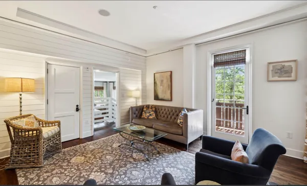 a bathroom with a sink mirror and a bathtub
