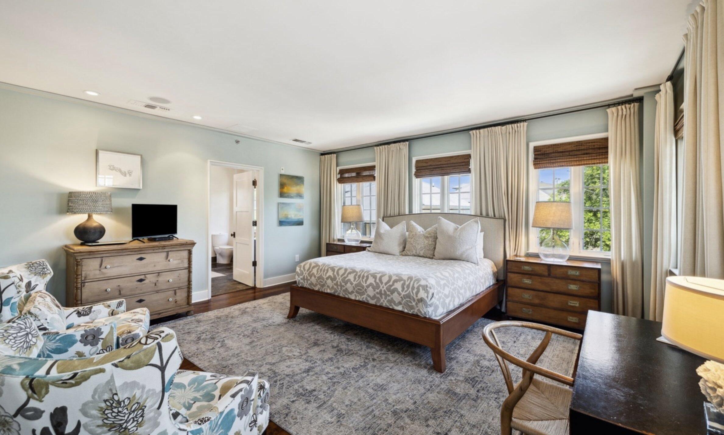 78 North Barrett Square, Unit 4 Inlet Beach, FL 32461 - Photo 17 of 36 a bedroom with furniture and a flat screen tv