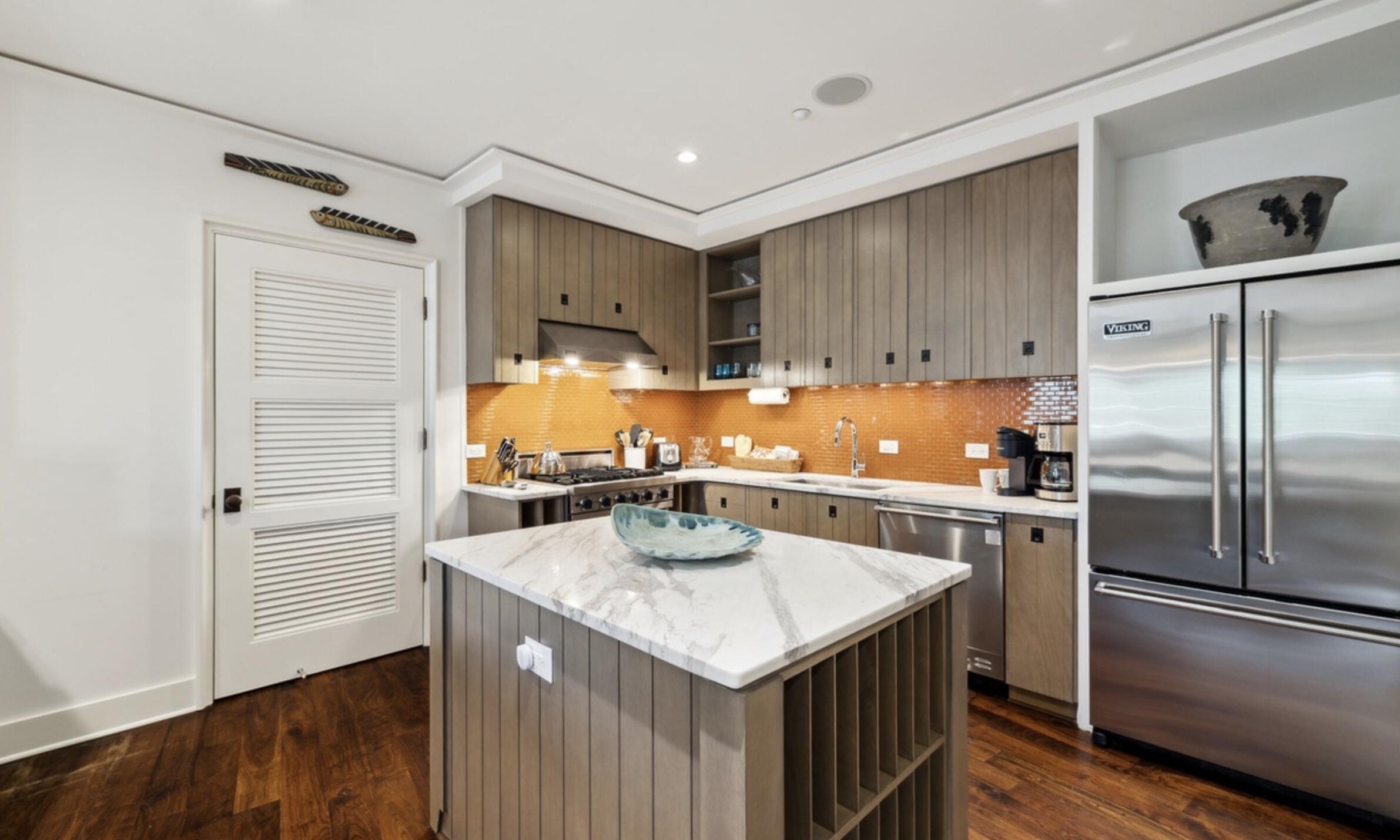 78 North Barrett Square, Unit 4 Inlet Beach, FL 32461 - Photo 10 of 36 a kitchen with stainless steel appliances granite countertop a sink stove and refrigerator