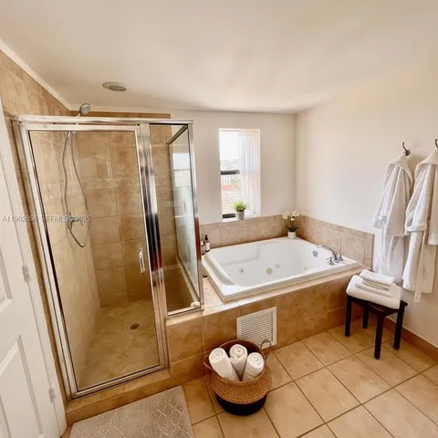 a bathroom with a sink and toilet