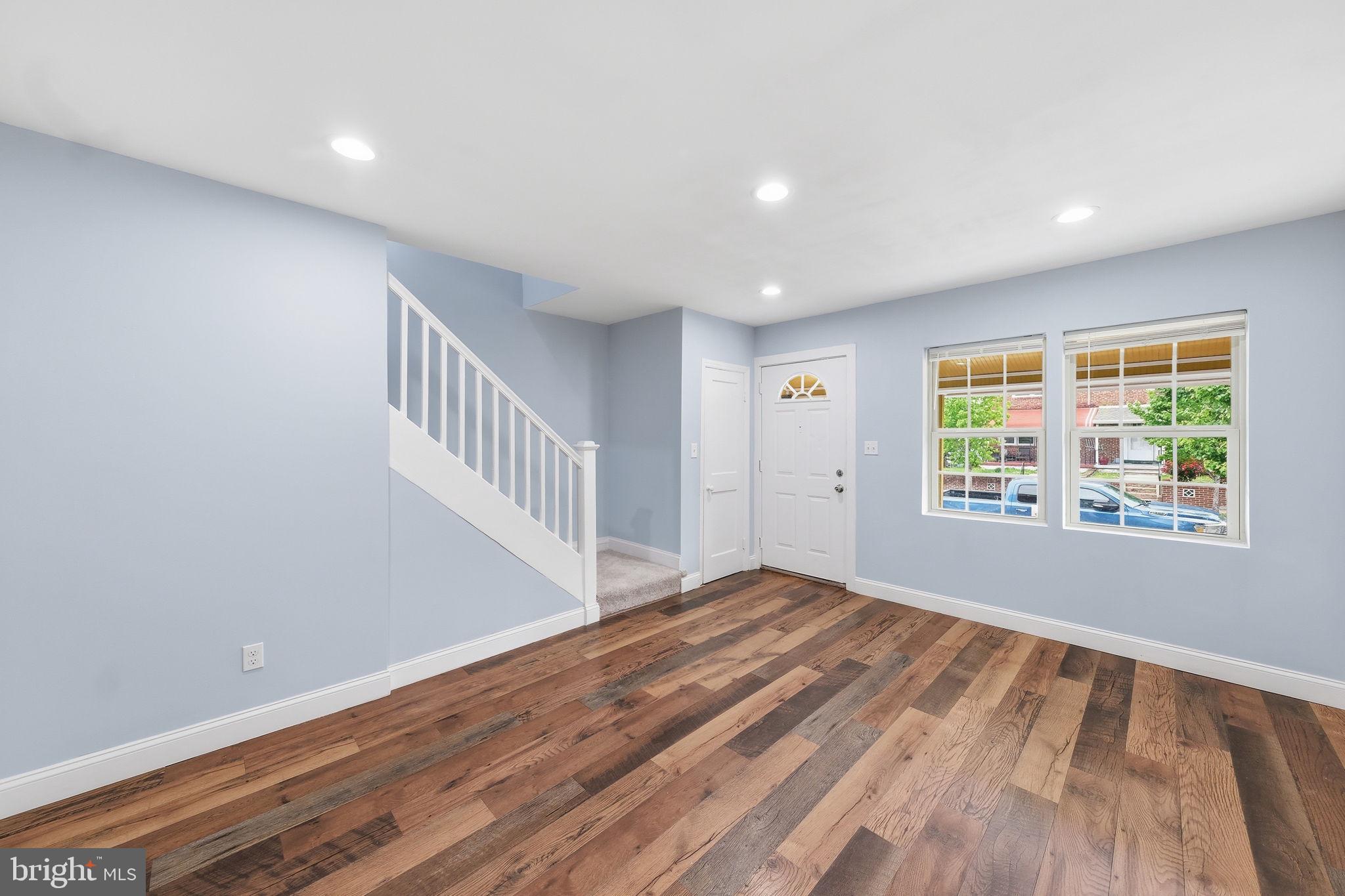 636 Hillview Road Baltimore, MD 21225 - Photo 3 of 19 Living room with new wood floors
