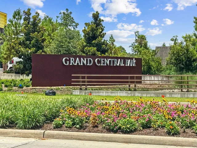 a view of a balcony with chairs and wooden floor