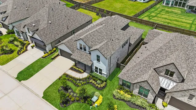 a view of sign board with flower around