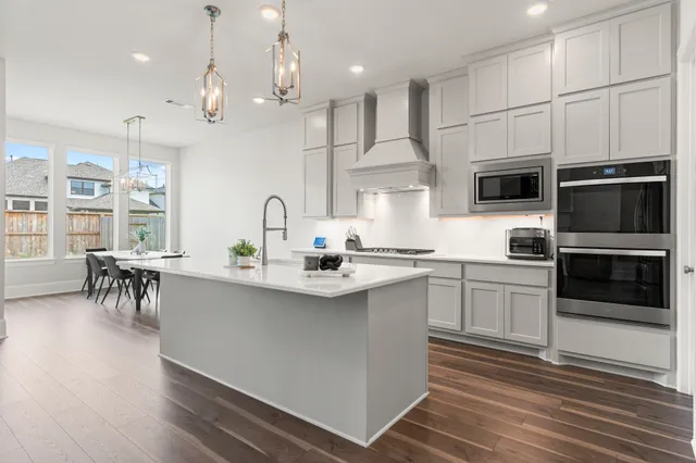 a living room with fireplace furniture and a flat screen tv