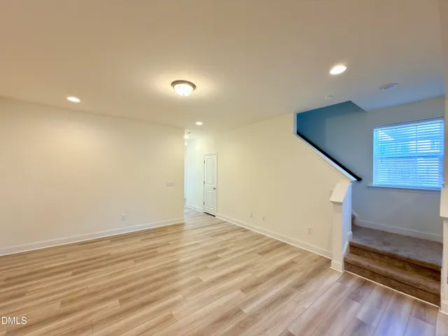 a view of a room with a hallway