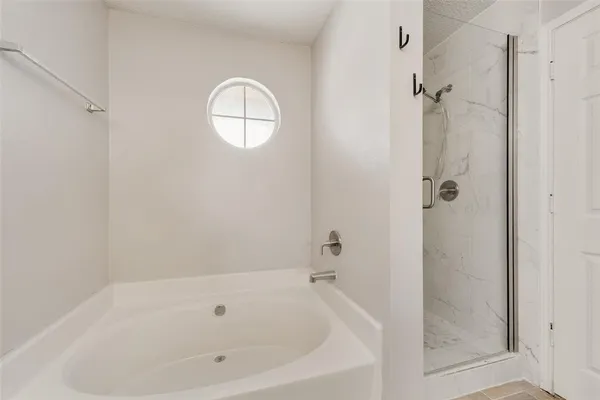 a bathroom with a bathtub