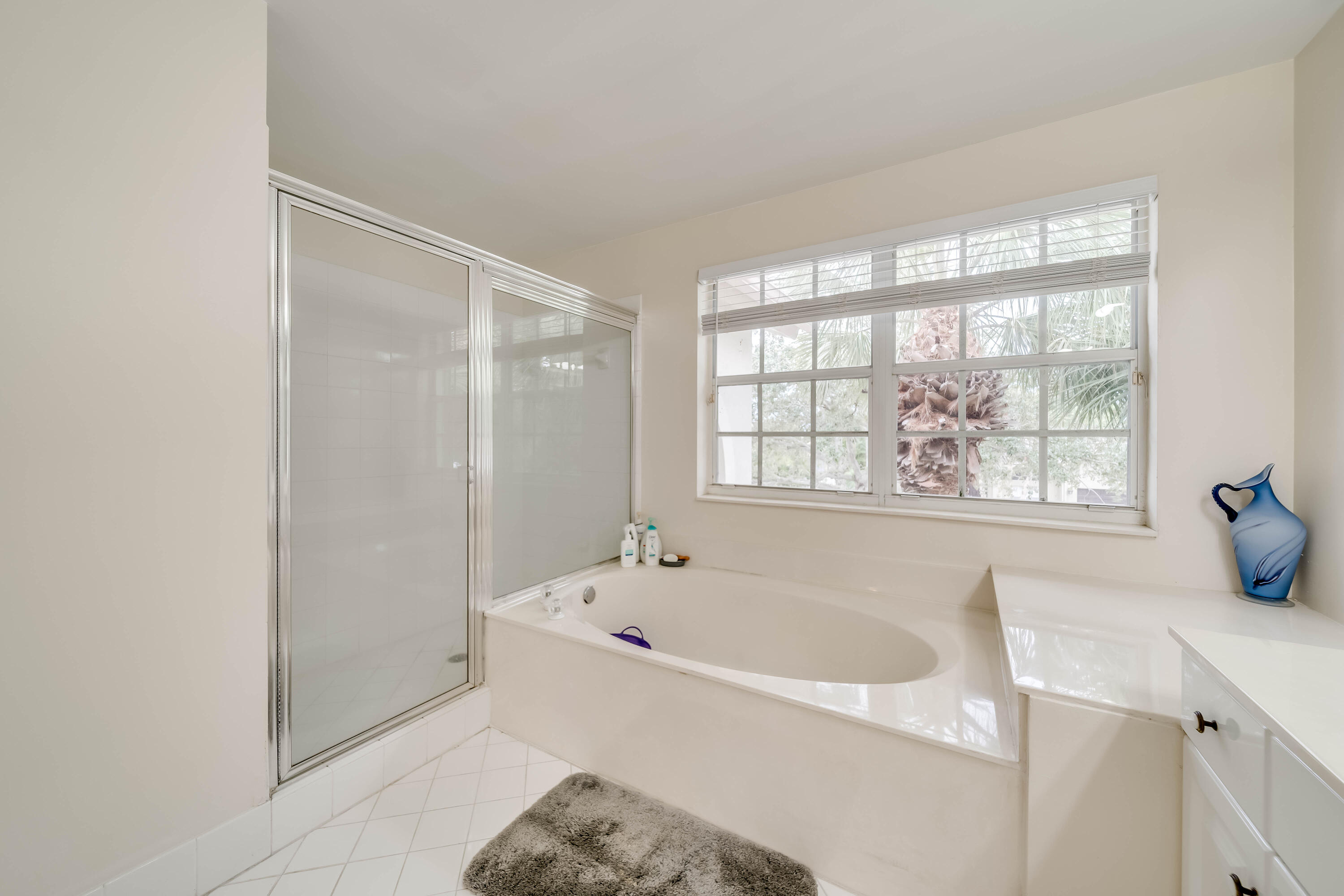 16738 Diamond Drive Weston, FL 33331 - Photo 22 of 38 a white bath tub sitting next to a window