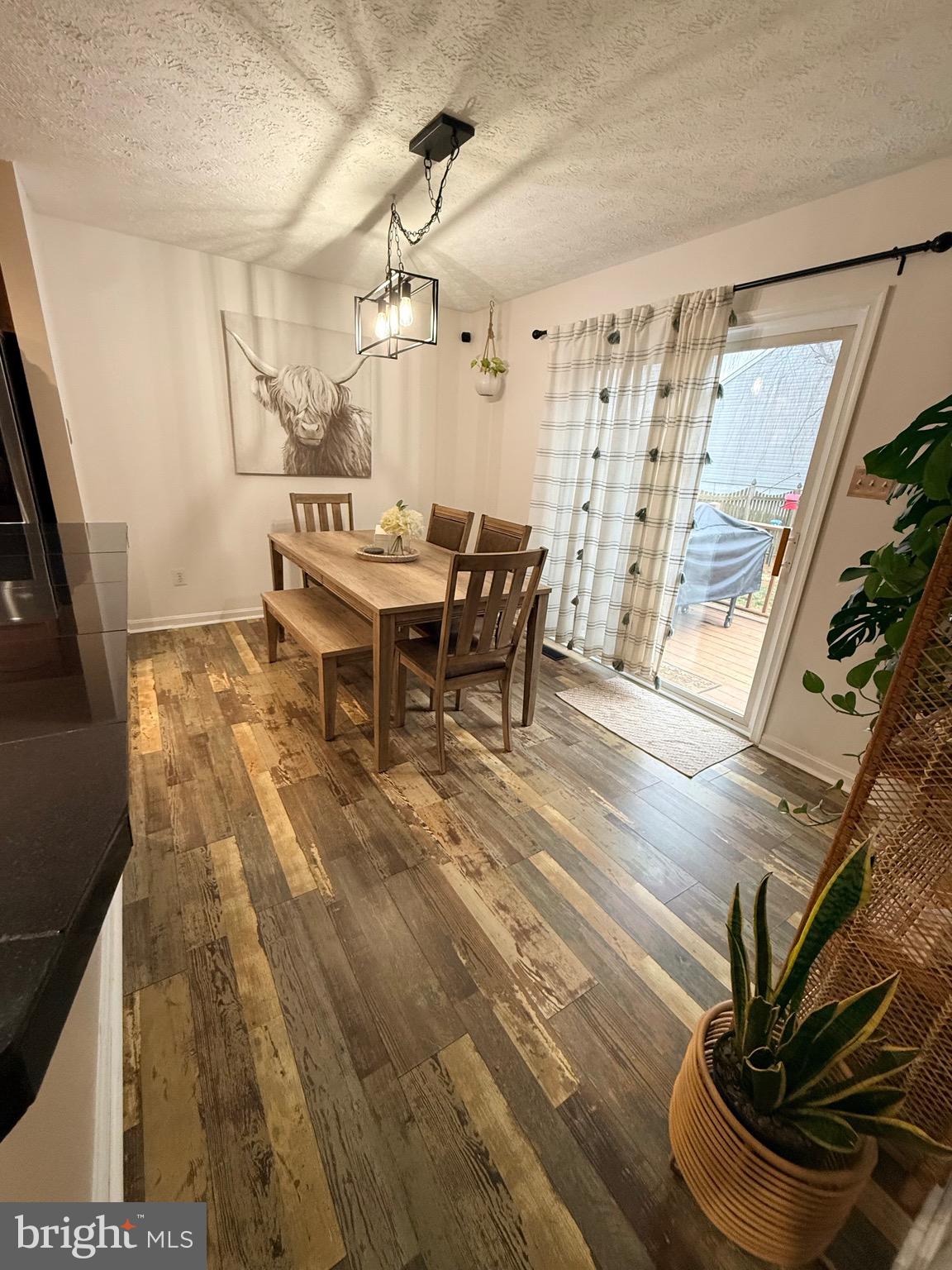 103 Broad Leaf Court Rising Sun, MD 21911 - Photo 19 of 47 a view of a dining room with furniture window and wooden floor