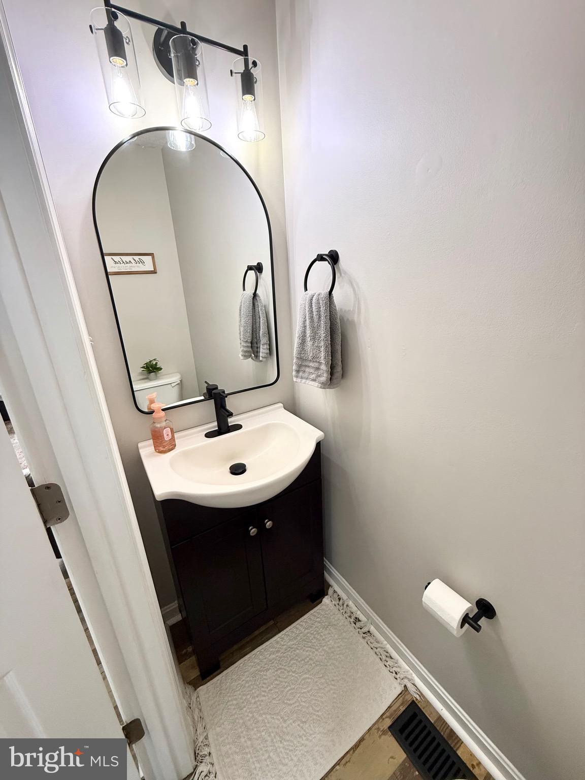 103 Broad Leaf Court Rising Sun, MD 21911 - Photo 21 of 47 a bathroom with a sink and mirror