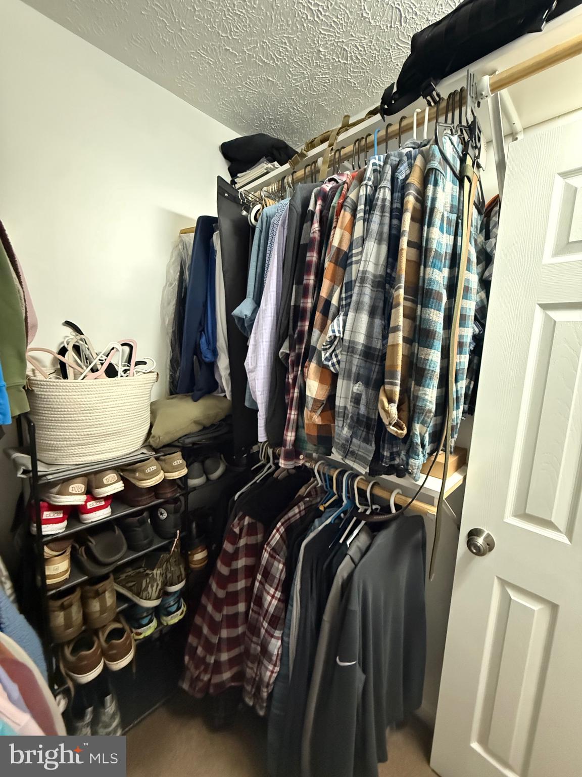 103 Broad Leaf Court Rising Sun, MD 21911 - Photo 30 of 47 a view of walk in closet with clothes and shoes