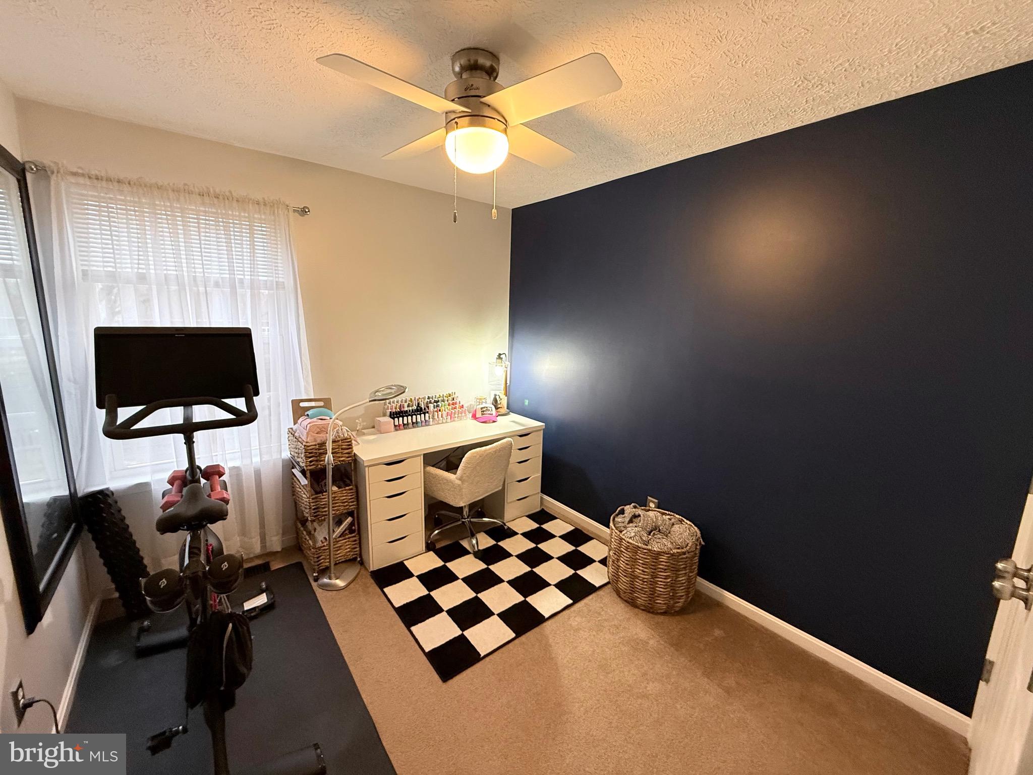103 Broad Leaf Court Rising Sun, MD 21911 - Photo 35 of 47 a kitchen with a stove and a flat screen tv