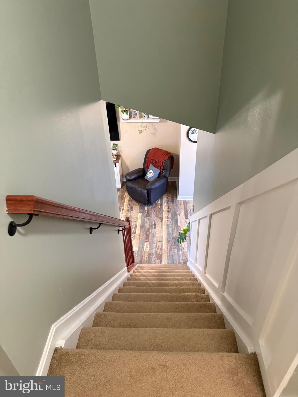 103 Broad Leaf Court Rising Sun, MD 21911 - Photo 38 of 47 a bedroom with a bed and a chandelier