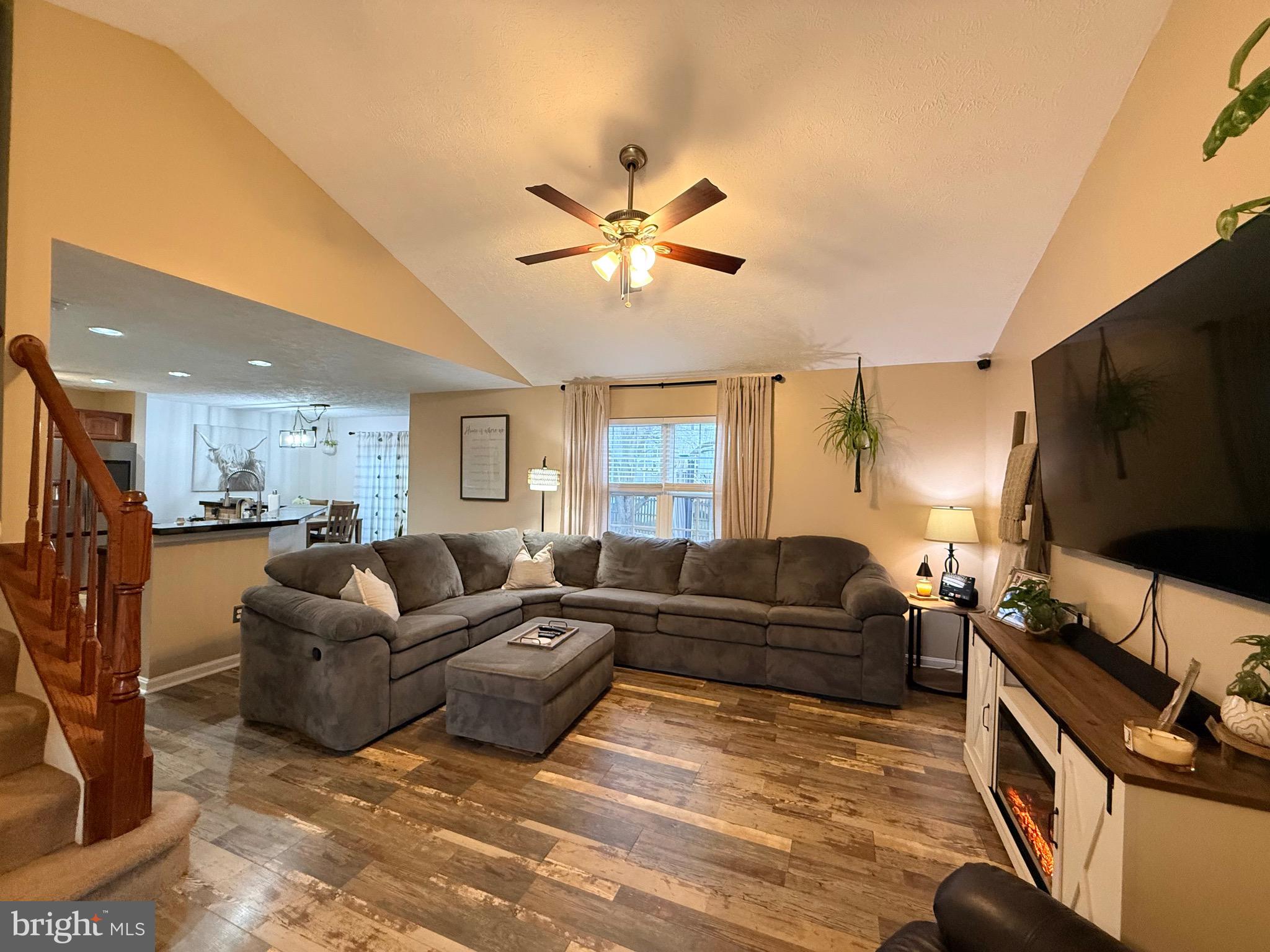 103 Broad Leaf Court Rising Sun, MD 21911 - Photo 7 of 47 a living room with furniture and a flat screen tv