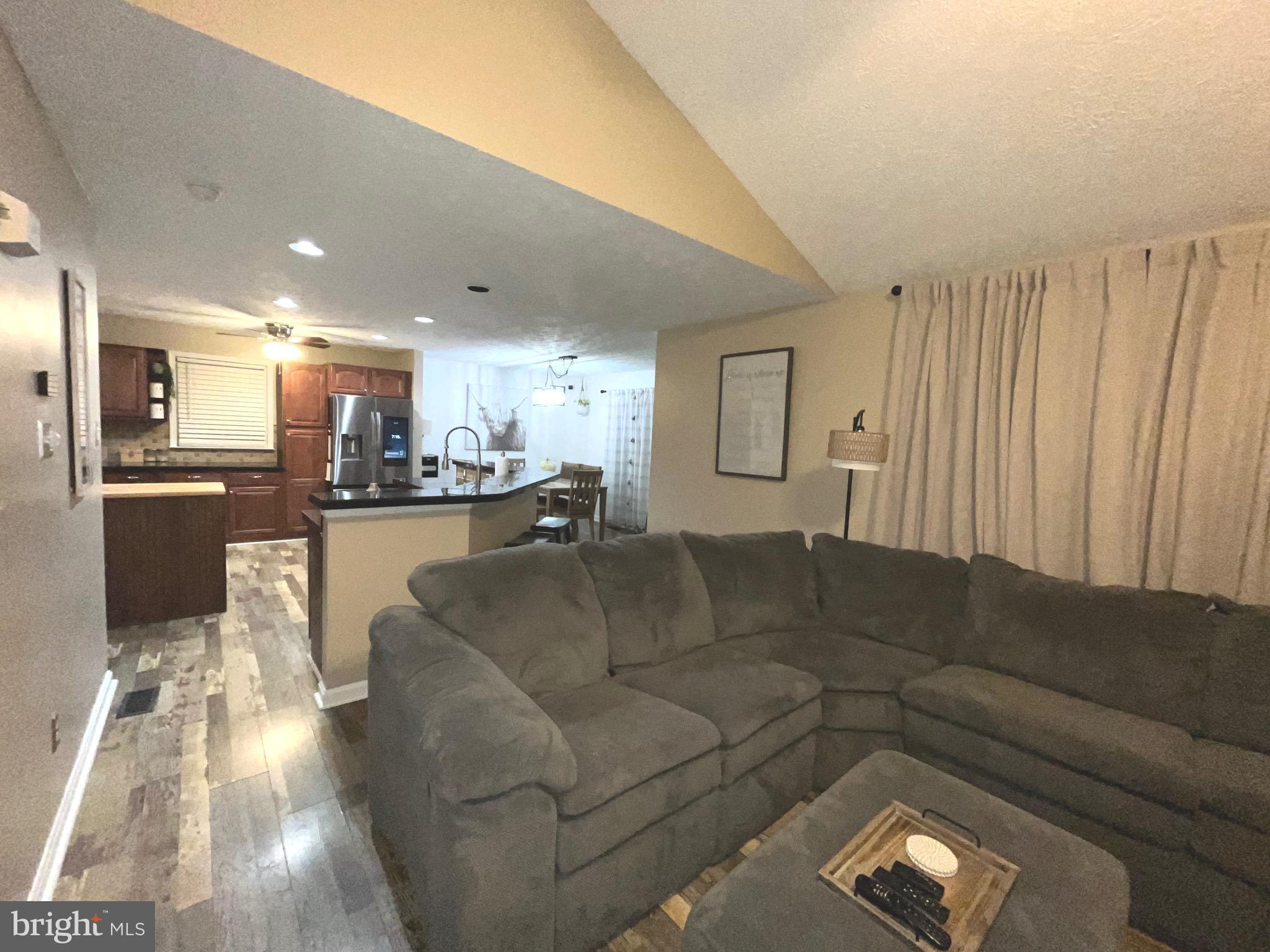 103 Broad Leaf Court Rising Sun, MD 21911 - Photo 10 of 47 a living room with furniture and kitchen view