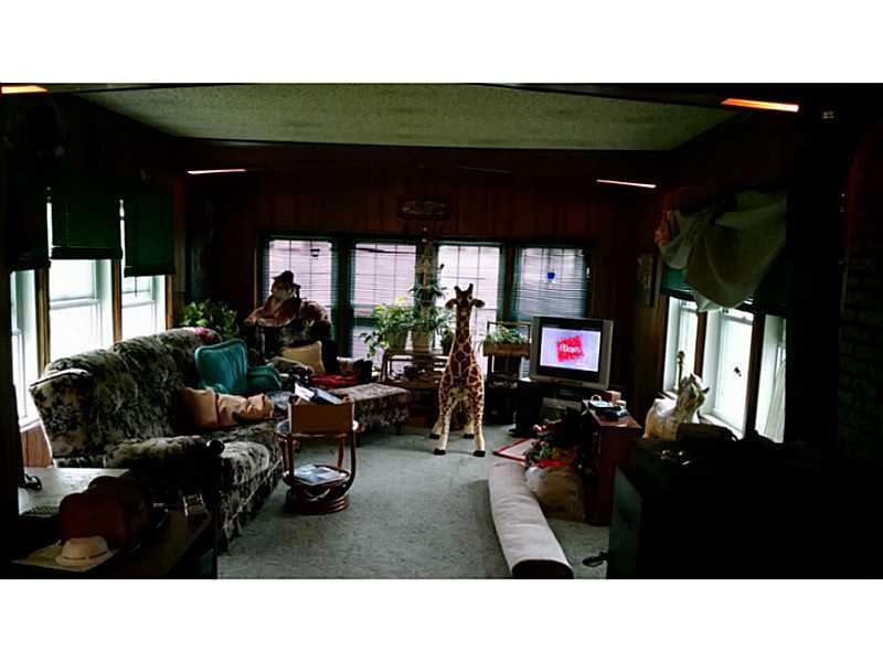 77 Lake Road Levant, ME 04456 - Photo 11 of 34 Living Room. Living room with lots...