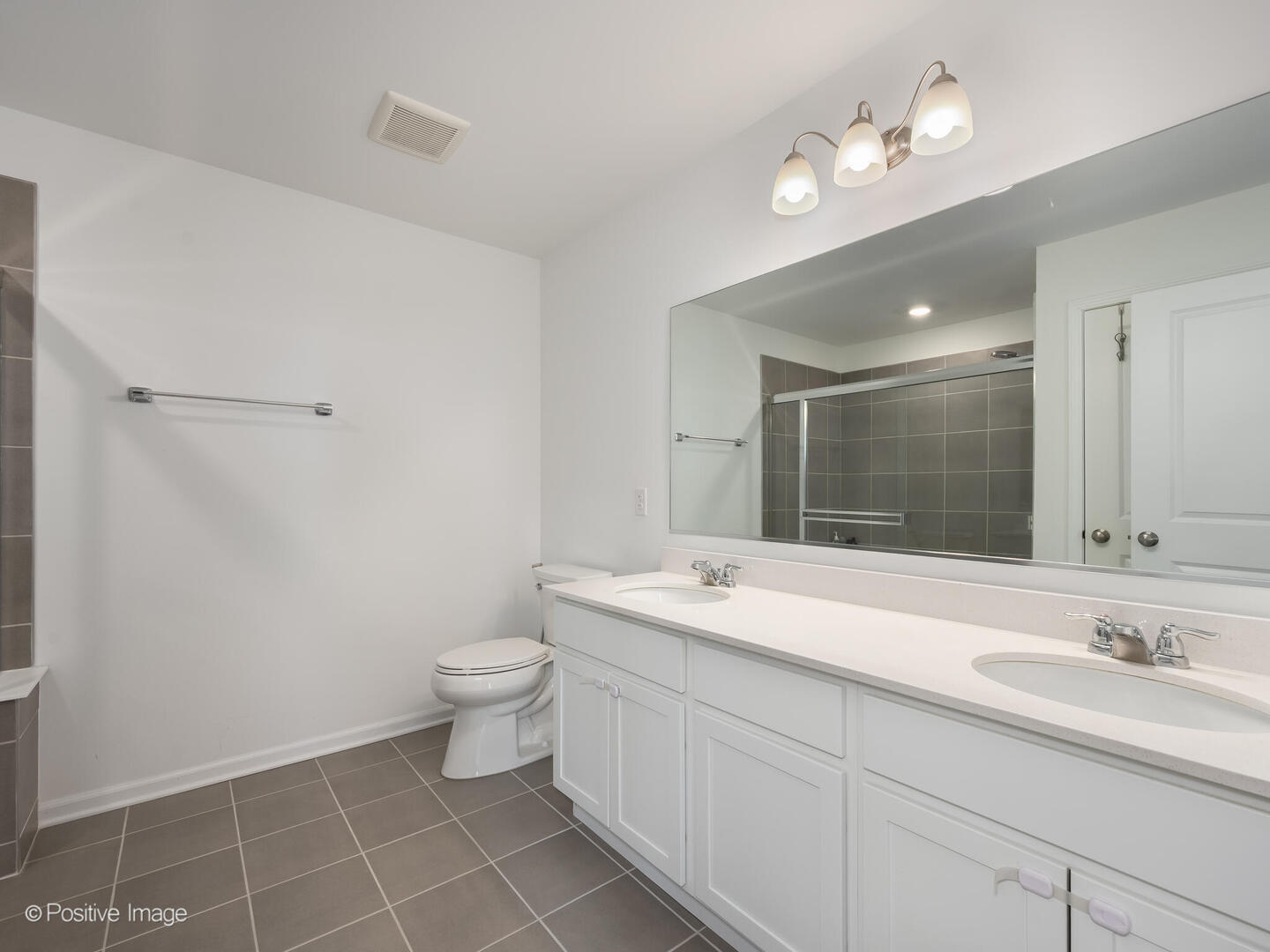 444 Radcliff Lane South Elgin, IL 60177 - Photo 18 of 26 a bathroom with a sink toilet and a mirror