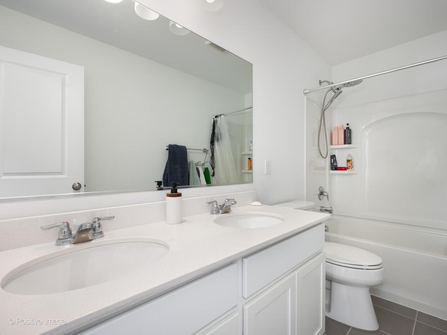 444 Radcliff Lane South Elgin, IL 60177 - Photo 21 of 26 a bathroom with a granite countertop sink a toilet and a mirror