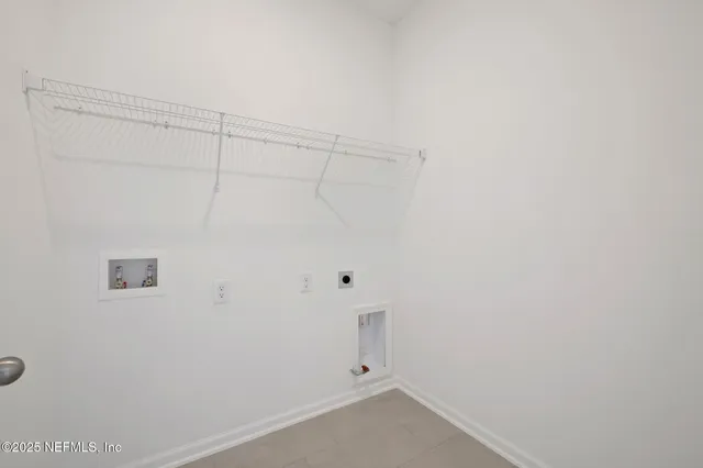a bathroom with a sink double vanity granite and a mirror