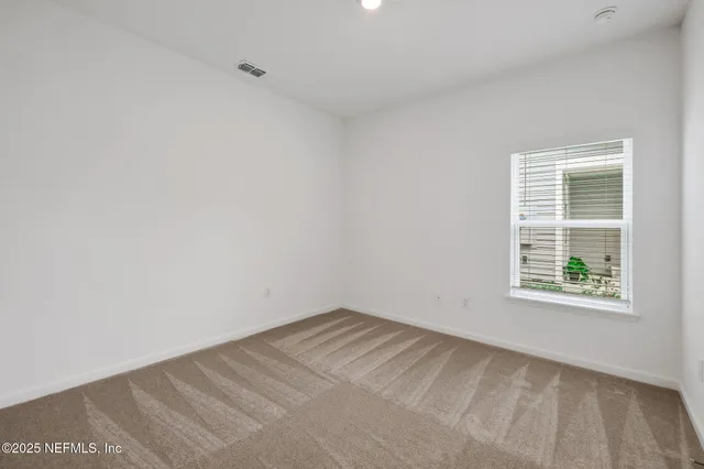 a view of a lake with a houses