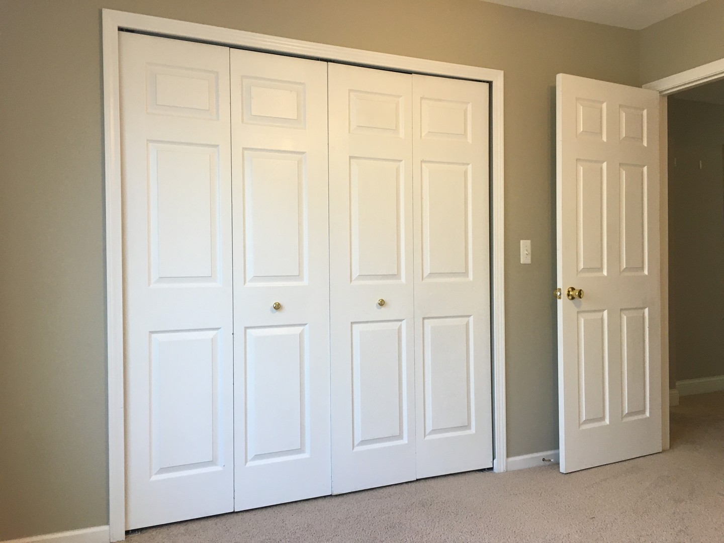 10123 Ashley Street Huntley, IL 60142 - Photo 27 of 33 an empty room with a wooden door
